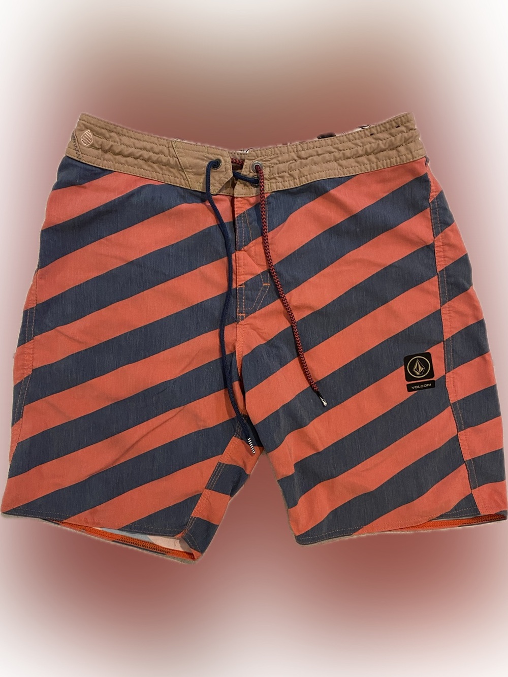 Volcom slingers board shorts, size 30, color red and blue